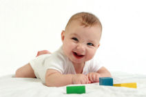 Fun Games to Encourage Your Baby's Development 8 baby playing small