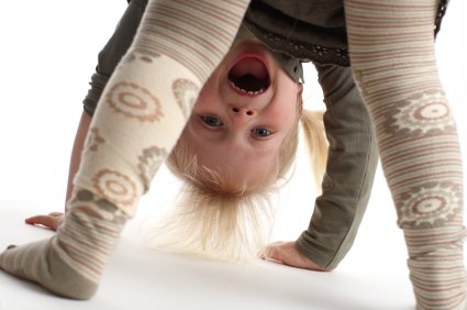 Milestones 24 to 36 Months from Toddler to Preschooler 8 little girl learning to somersault