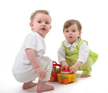 Encouraging Baby's Social Development 8 say cheese, baby boy and girl playing together